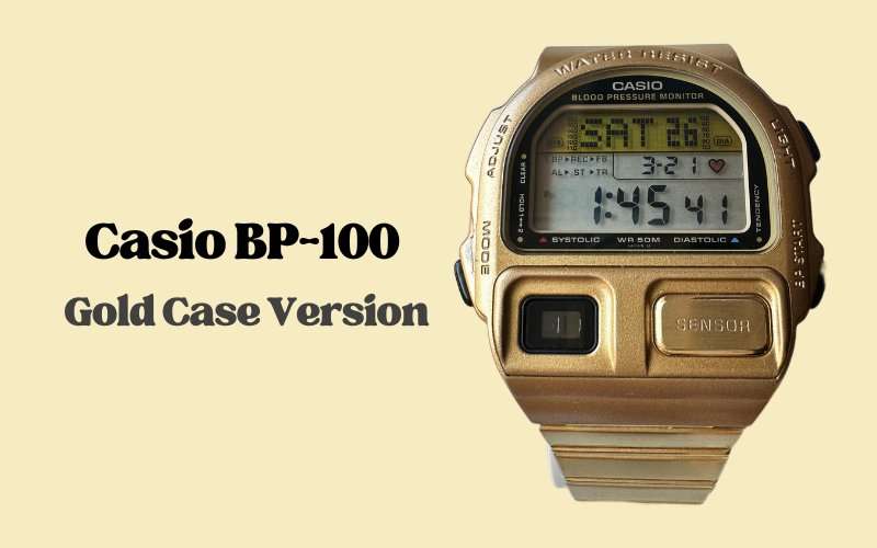 Casio BP-100 gold case digital blood pressure monitor watch with LCD display and sensor pad