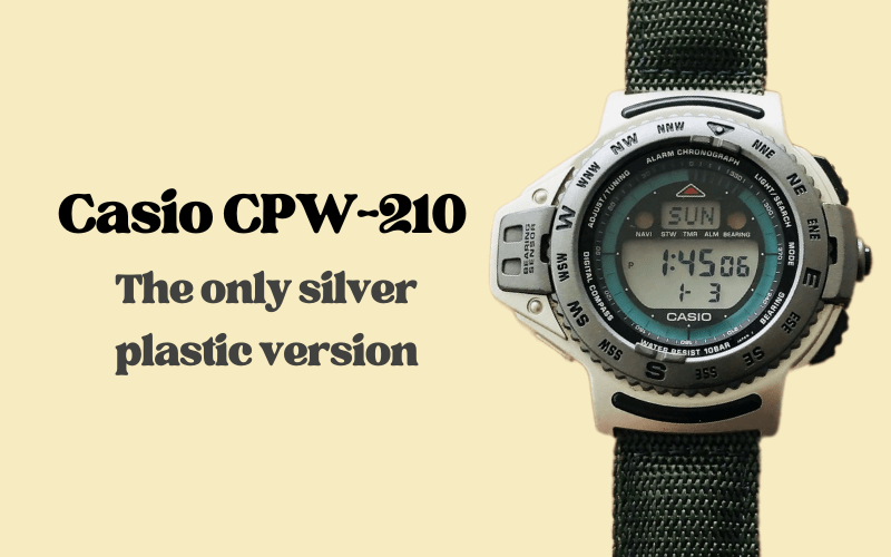 Casio CPW-210 silver plastic compass watch with green nylon strap shown in close-up.