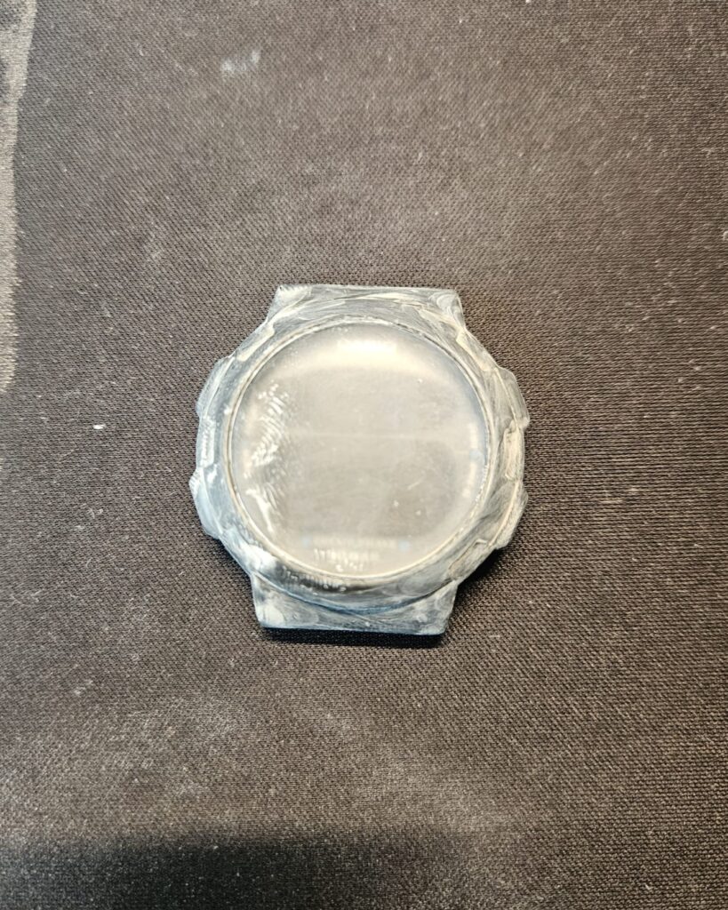 Casio CGW-50 Cosmo Phase watch case after initial cleaning and polishing.