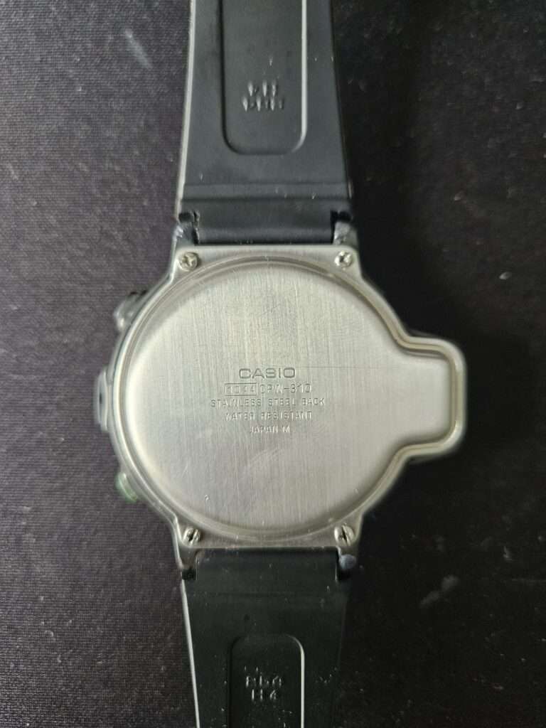 Back of Casio CPW-310 watch with stainless steel case and Japan M marking.