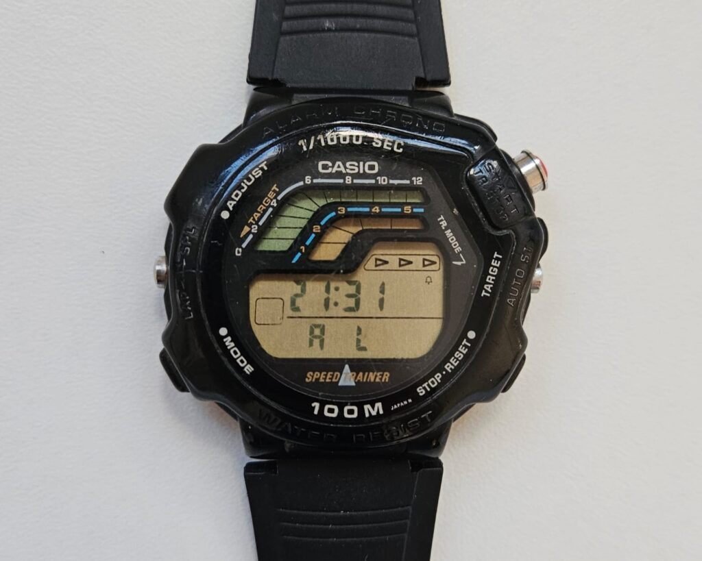 Casio STR-1000 digital sports watch showing display and buttons before restoration.