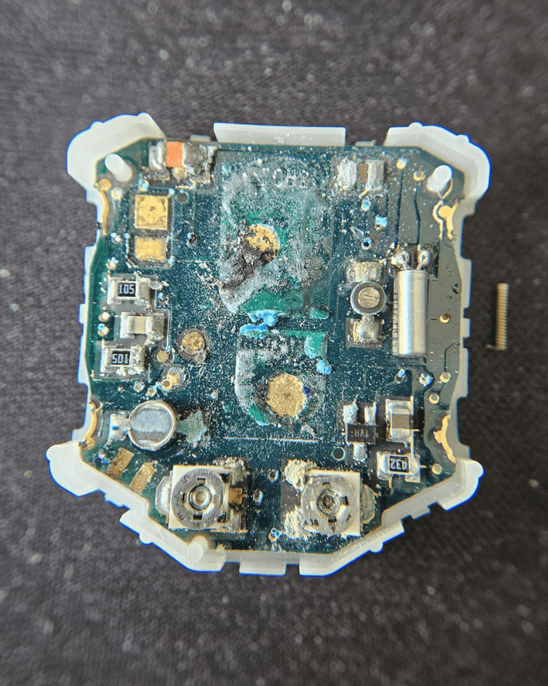 Severely corroded Casio BM-200 module with battery leakage damage.