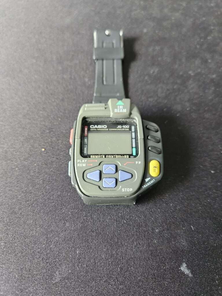 Casio JG-100 full front view with detached strap.