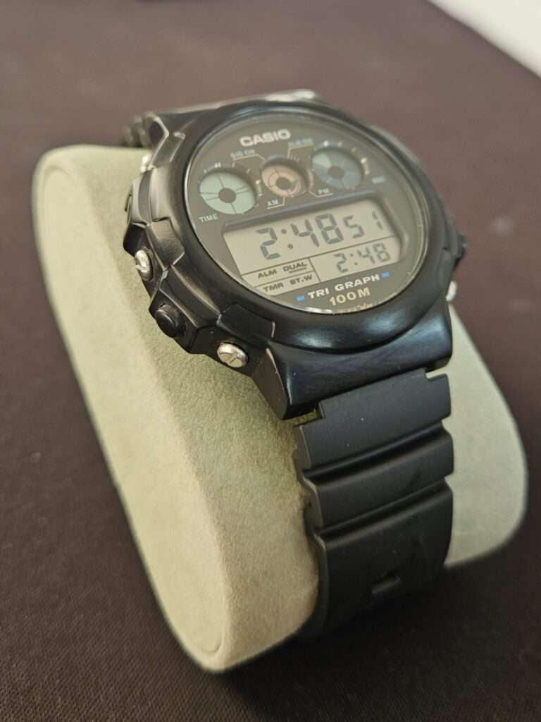 Side profile of Casio TGW-10 Tri Graph digital watch with visible control buttons