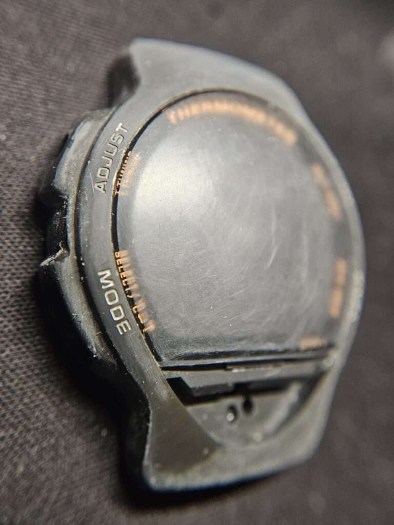 Casio TS-200 watch acrylic glass sanding process on left side