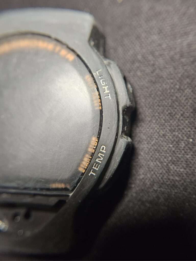 Casio TS-200 watch acrylic crystal sanding on right side near buttons