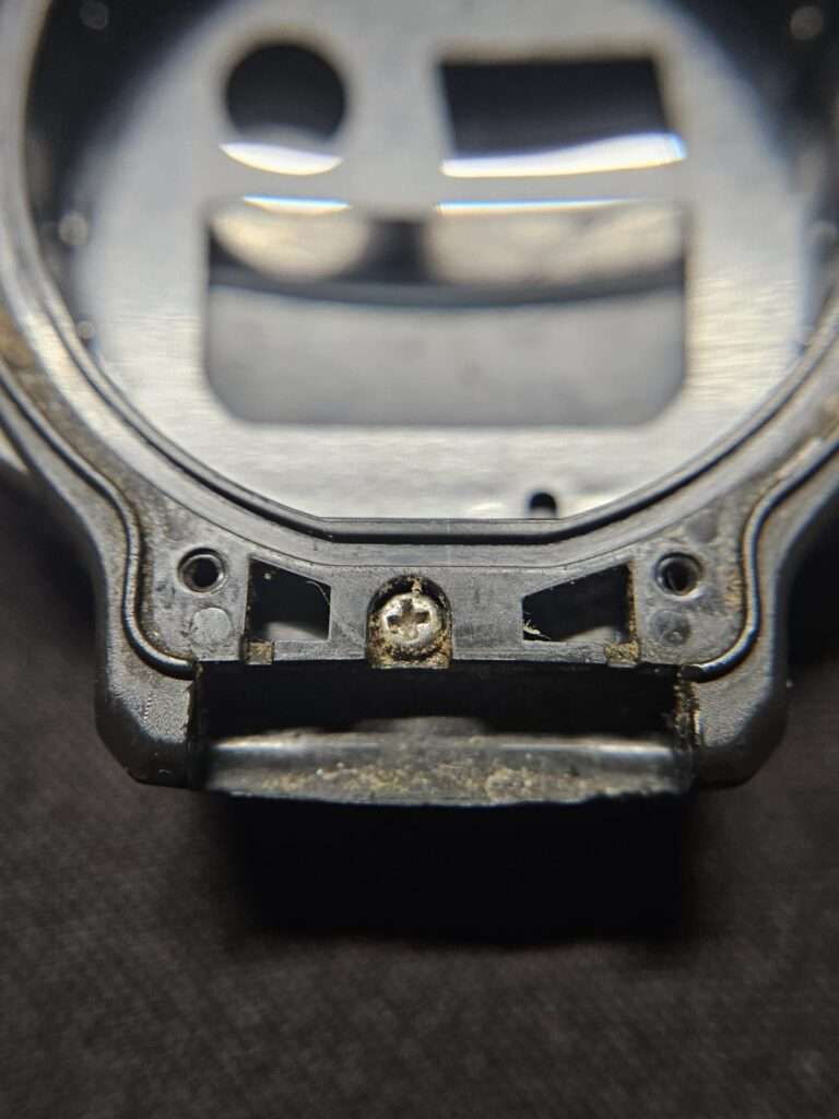 Casio TS-200 digital watch angled view showing side buttons and bezel