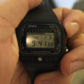Casio TS-1000 Thermometer 100M digital watch held in hand after light repair service