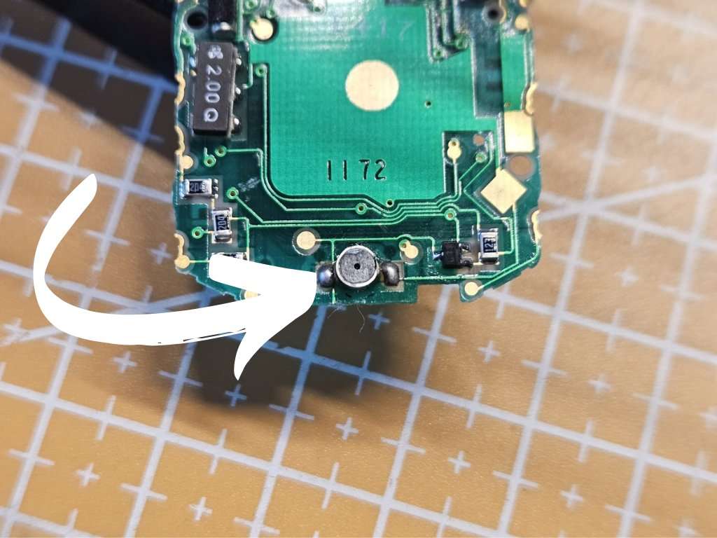 Repaired Casio CMD-30 module with working LCD display showing SU 1-1 and time 12:00:34 in TV remote mode