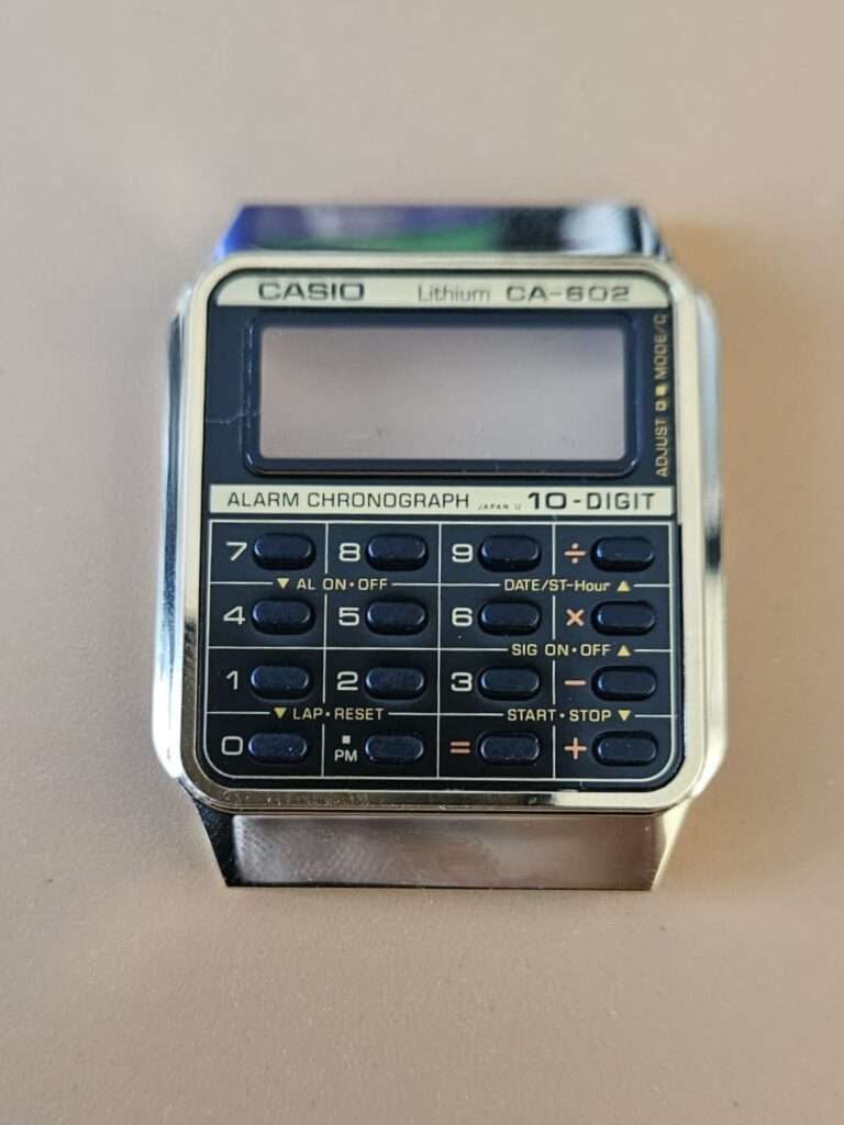 Casio CA-602 Lithium 10-digit calculator watch used as donor for CA-505 keypad transplant restoration