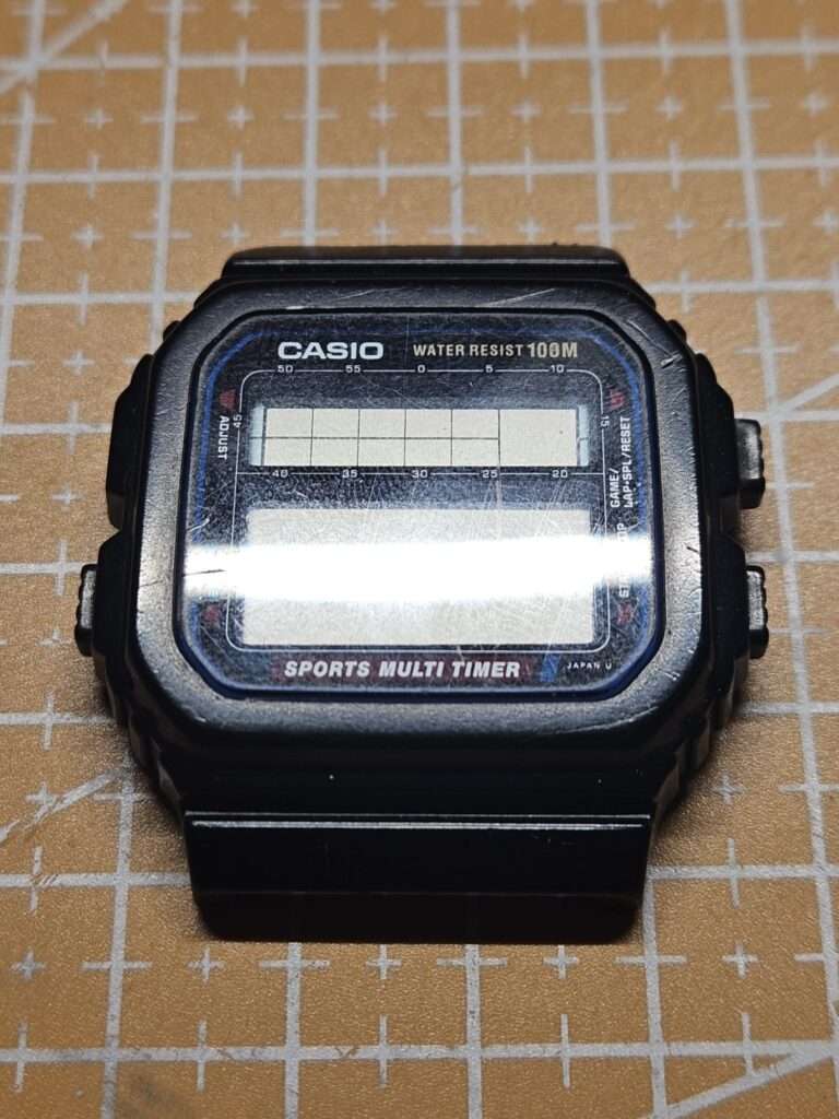 Casio STW-100 Sports Multi Timer with blank, non-functional LCD display before restoration