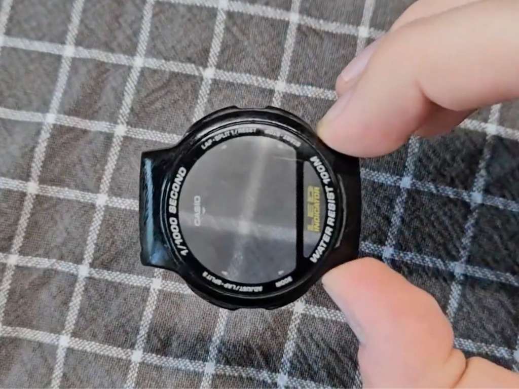 Frosted matte Casio watch crystal after sanding with sandpaper before polishing