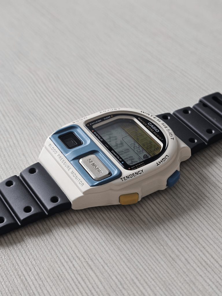 Restored Casio BP-100 white blood pressure watch fitted with new black resin strap