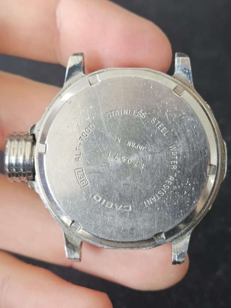 Casio ALT-7000 stainless steel case back engraving reading water resistant Japan K