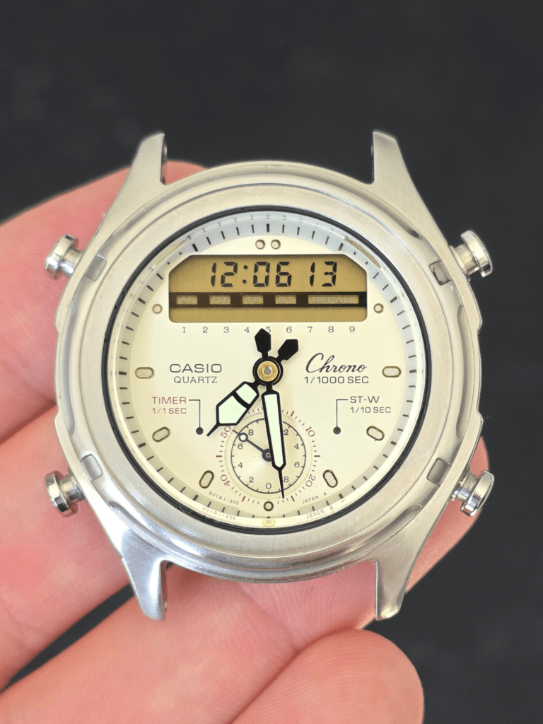 Casio Quartz Chrono AW-600 dial fully restored with digital display reading 12:06:13