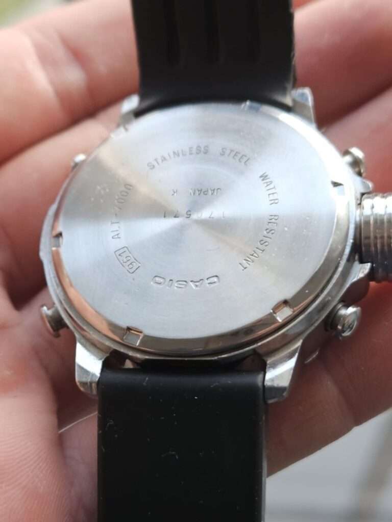Close-up of restored Casio Pro Trek ALT-7000 digital display showing time and twin sensor bezel