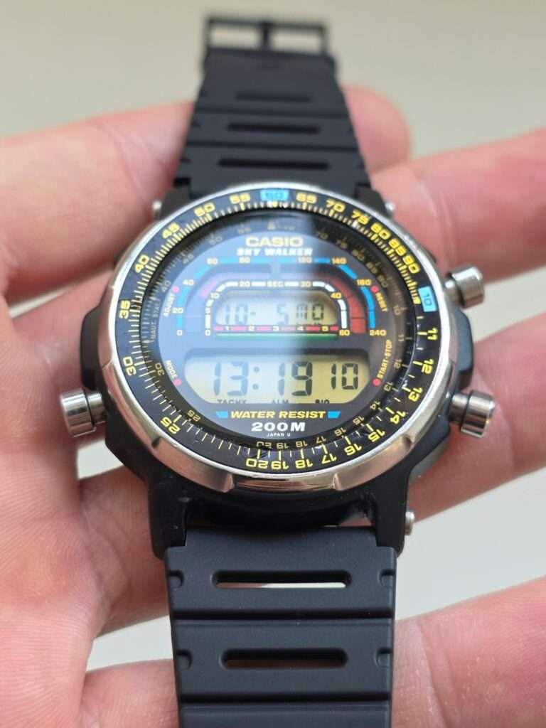 Casio DW-401 Sky Walker with polished mineral crystal, clear LCD dial and yellow tachymeter bezel