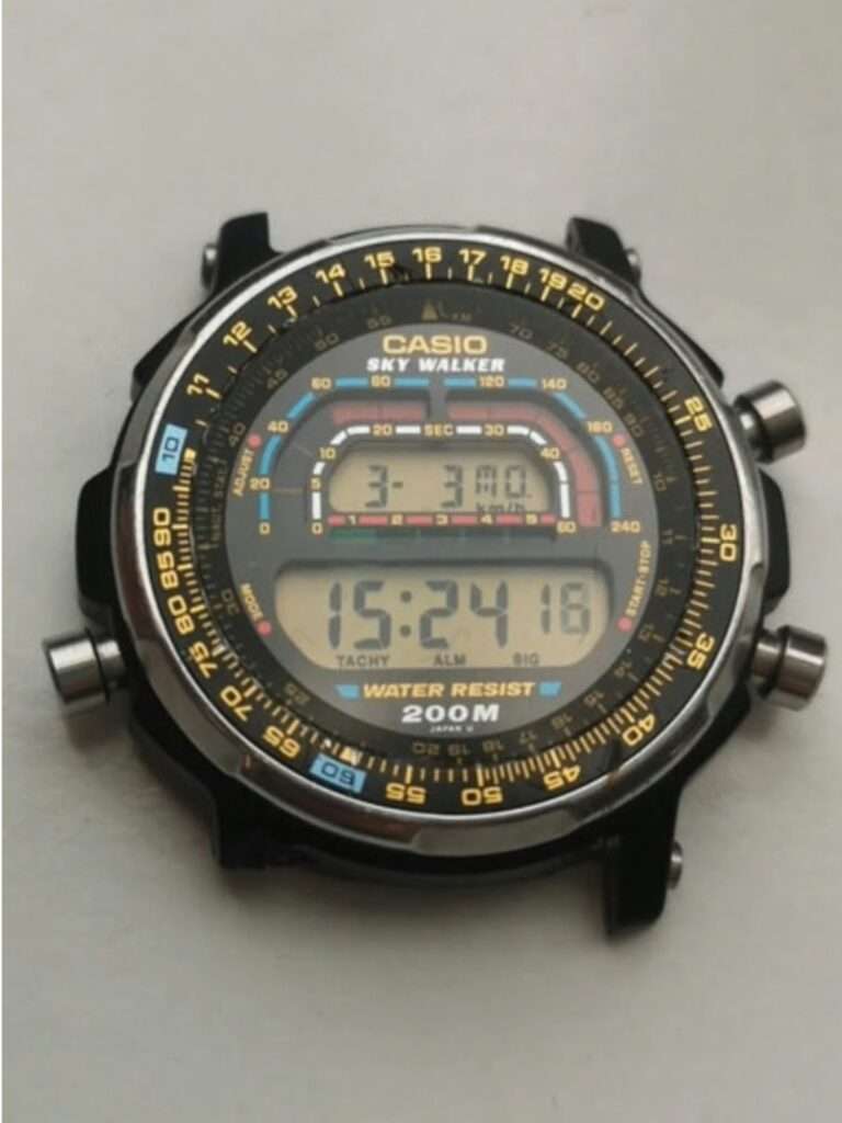 Casio DW-401 Sky Walker watch head without strap, scratched mineral crystal and yellow tachymeter bezel